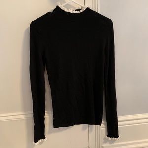 h&m black sweater with white ruffle trim